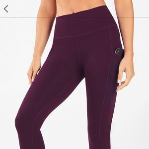 Fabletics | On-the-Go PowerHold High-Waisted Leggings Burgundy Size Medi…